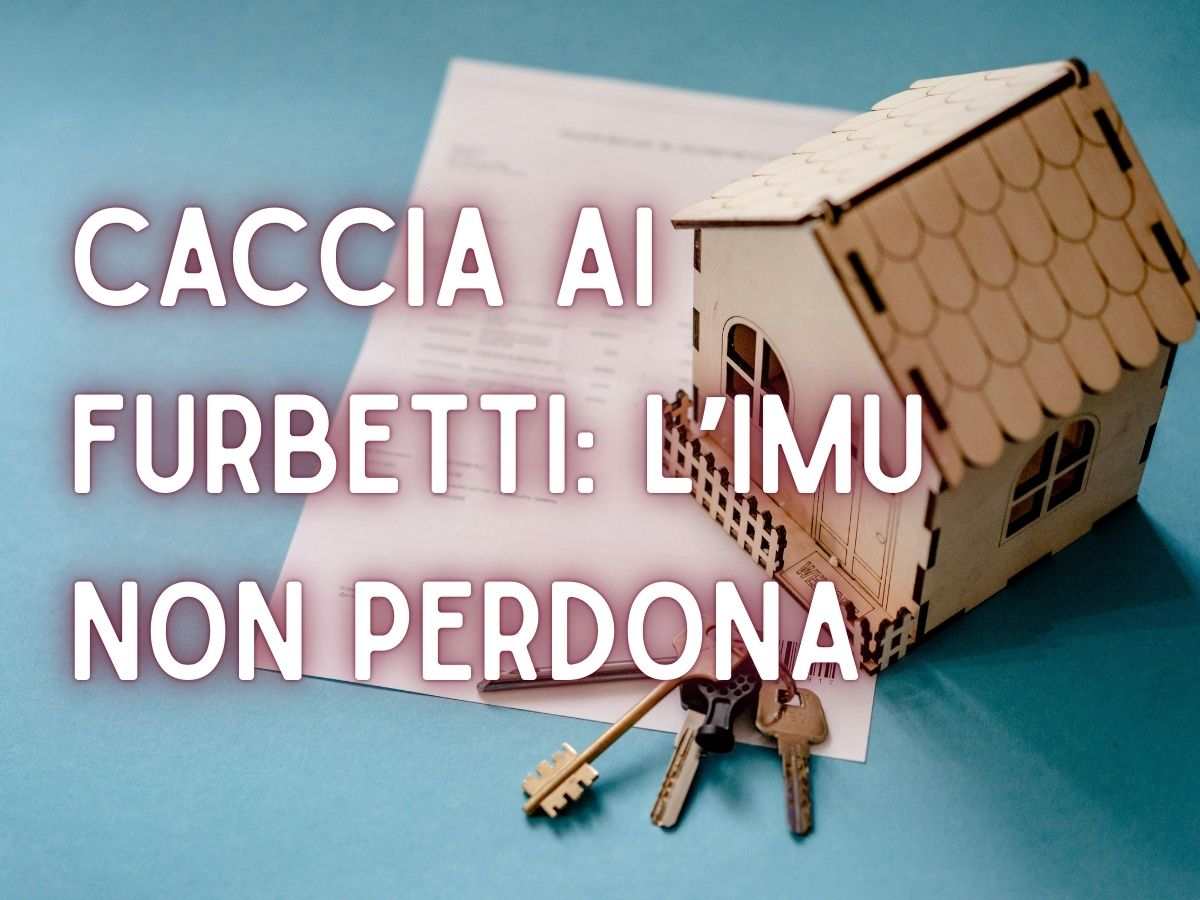 modelino di una casa con mazzo di chiavi